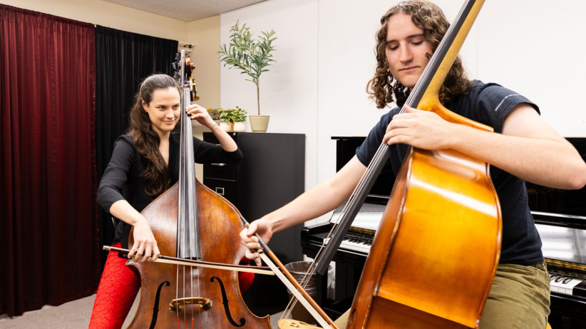 Professor of double bass works with her student